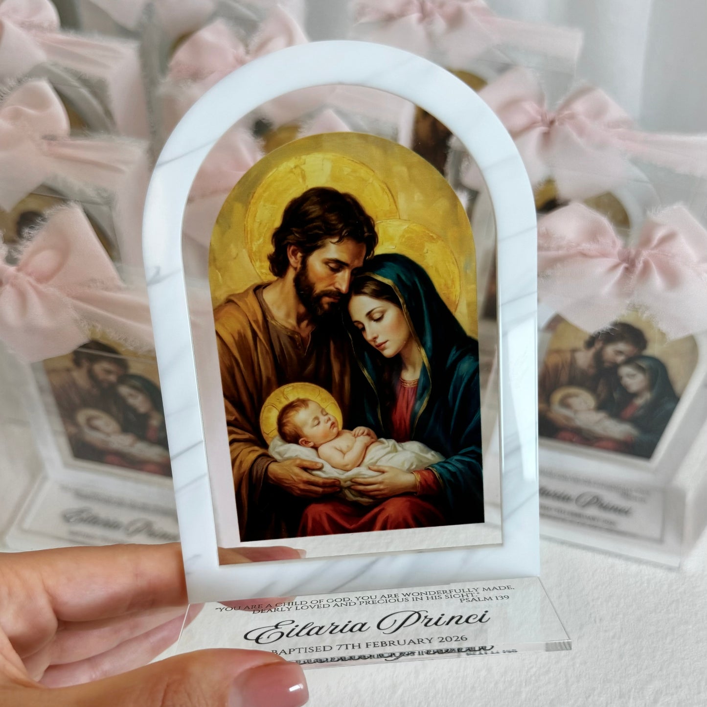 Favour religious acrylic with a depiction of the Holy Family against a white background personalised with child’s name 